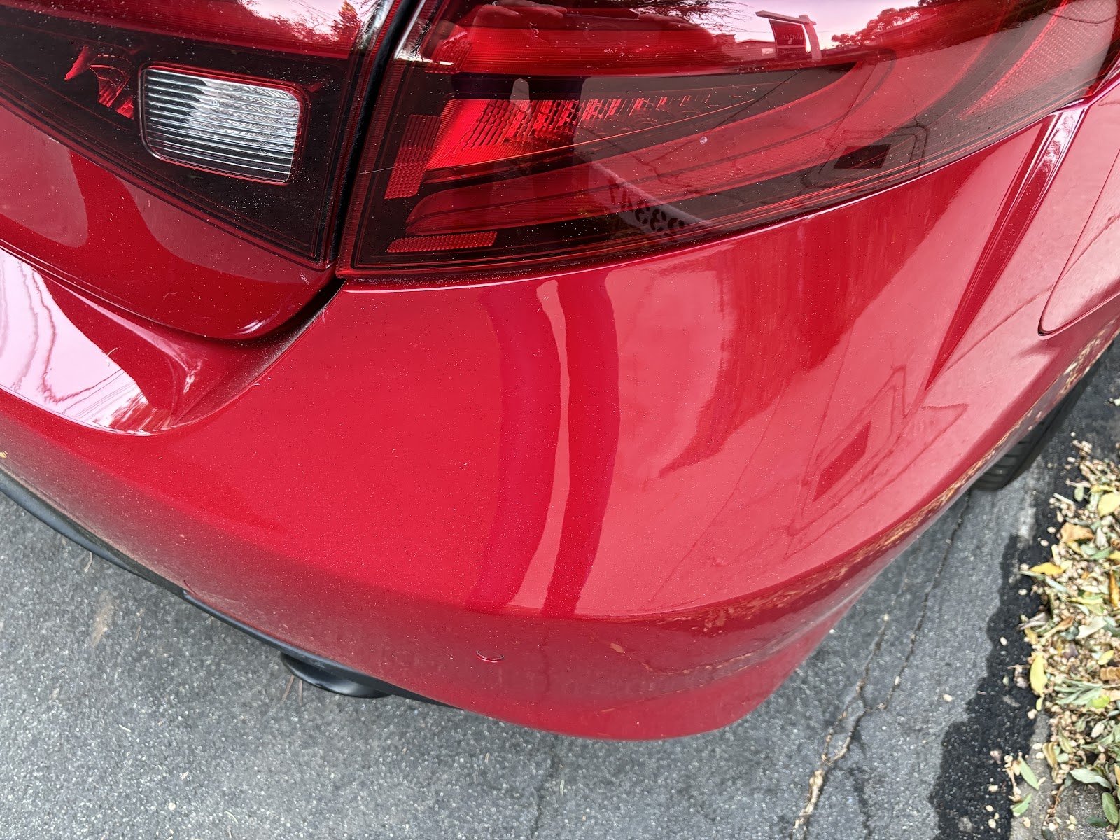 Close-up of a refinished taillight and rear quarter panel